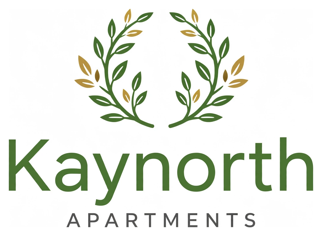 Kaynorth Apartments logo — green laurel branches with gold leaves above the Kaynorth name